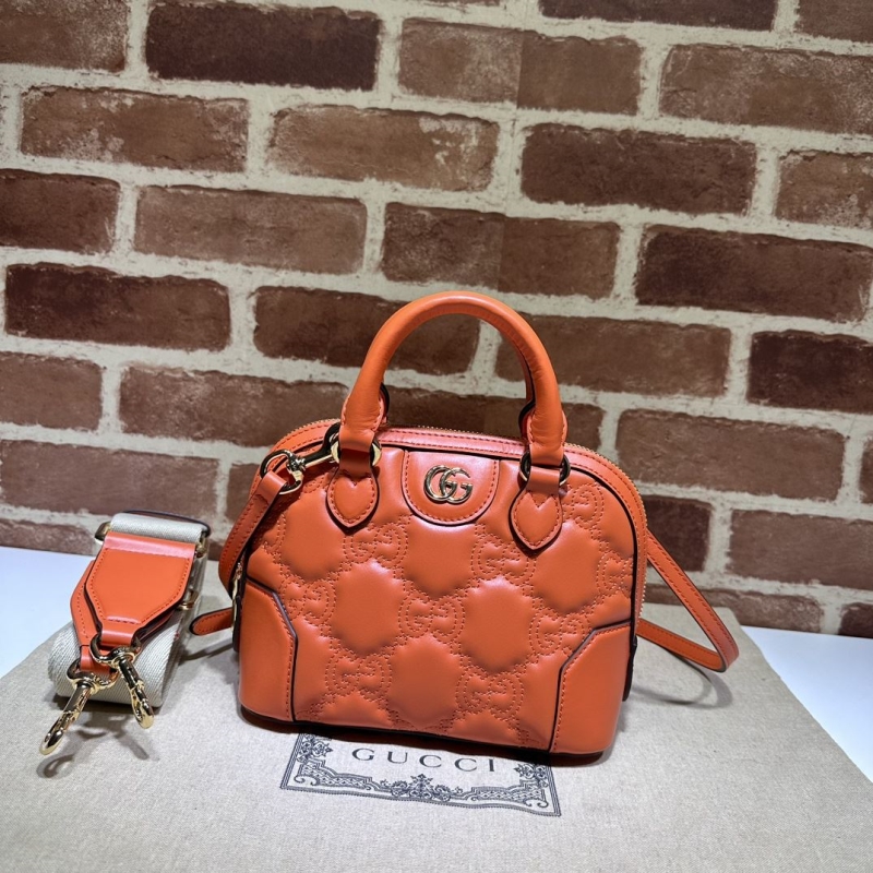G*u*i top handle bags